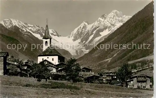 AK / Ansichtskarte  Kippel_VS im Loetschental mit Kirche Langgletscher Sattelhorn und Schienhorn 