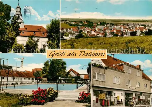 AK / Ansichtskarte 73866153 Dauborn_Huenfelden Panorama Kirche Freibad Ladengeschaefte 