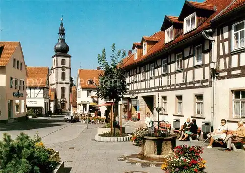 AK / Ansichtskarte 73866173 Gersfeld_Rhoen Marktplatz Kirche Fachwerkhaeuser Gersfeld Rhoen