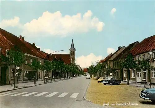 AK / Ansichtskarte 73869154 Sonsbeck Strassenpartie mit Kirche Sonsbeck