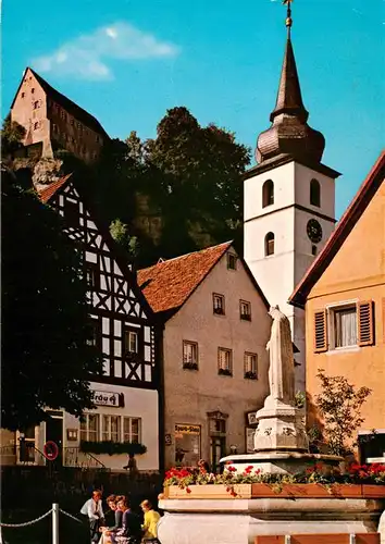 AK / Ansichtskarte 73932333 Pottenstein_Oberfranken Brunnen Kirche