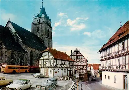 AK / Ansichtskarte 73935661 Wolfhagen Marktplatz Fachwerkhaeuser Kirche