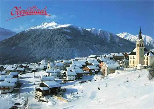 AK / Ansichtskarte 73970382 Obertilliach_Tirol_AT Winterpanorama Ortsansicht mit Kirche