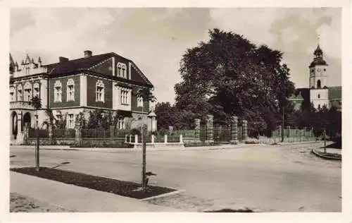 AK / Ansichtskarte 73975409 Kravare_ve_Slezsku_Praha_CZ Blick zur Kirche