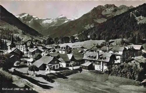 AK / Ansichtskarte  Gstaad_Saanen_BE Gesamtansicht mit Alpenpanorama